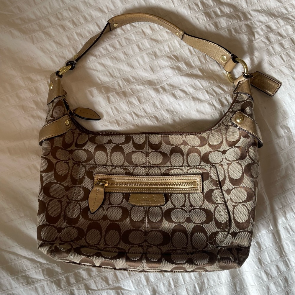 Coach monogrammed gold shoulder bag